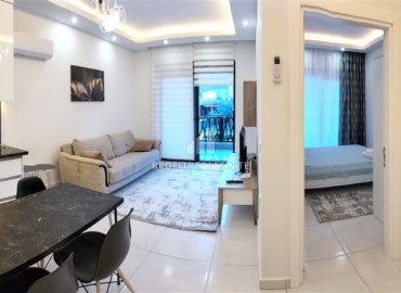 Furnished one-bedroom apartment 58m2, in a residence with developed facilities in Mahmutlar, Alanya ID-12957 фото-17