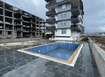 Новая двухкомнатная квартира в чистовой отделке, в 300 метрах от моря,  Газипаша, Аланья, 45 м2 ID-12969 фото-1