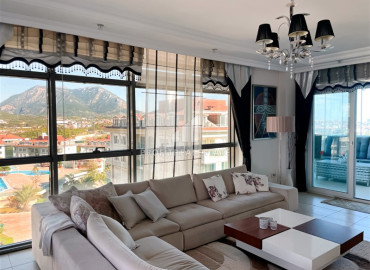 Stylish furnished penthouse 210 m2, with a sea view, with a glazed balcony in Oba, Alanya ID-12977 фото-3