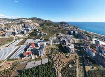 Attractive investment project in installments, 200 meters from the sea, in the fashionable area of Kargicak, Alanya, 60-130 m2 ID-12986 фото-9