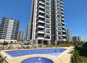 Three bedroom apartment, 140m², in a gasified residence with a swimming pool in Mezitli, Mersin ID-12993 фото-1