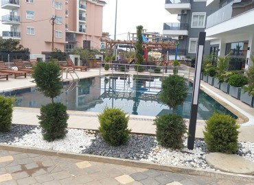 New one bedroom apartment, unfurnished, in the prestigious area of Oba, Alanya, 44 m2 ID-13053 фото-1