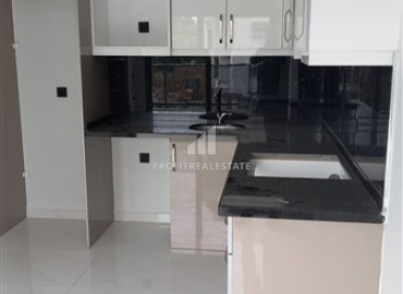 New one bedroom apartment, unfurnished, in the prestigious area of Oba, Alanya, 44 m2 ID-13053 фото-3