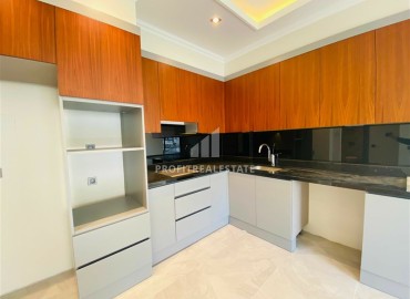 Новая двухкомнатная квартира 63 м2, с чистовой отделкой, без мебели, в 300 метрах от моря в Каргыджаке, Аланья ID-13062 фото-2