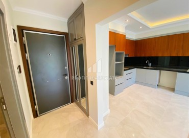 Новая двухкомнатная квартира 63 м2, с чистовой отделкой, без мебели, в 300 метрах от моря в Каргыджаке, Аланья ID-13062 фото-4