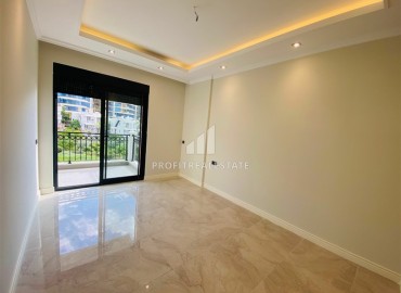 Новая двухкомнатная квартира 63 м2, с чистовой отделкой, без мебели, в 300 метрах от моря в Каргыджаке, Аланья ID-13062 фото-7
