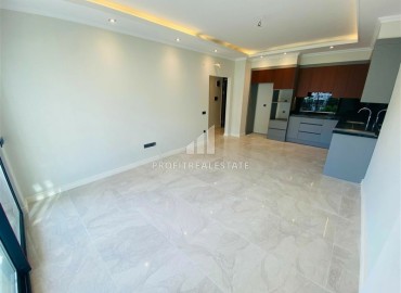 Новая двухкомнатная квартира 63 м2, с чистовой отделкой, без мебели, в 300 метрах от моря в Каргыджаке, Аланья ID-13062 фото-8