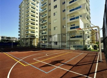 Элегантная двухкомнатная квартира 55 м2, в 500 метрах от моря, в фешенебельном жилом комплексе в Махмутларе, Аланья ID-13080 фото-17