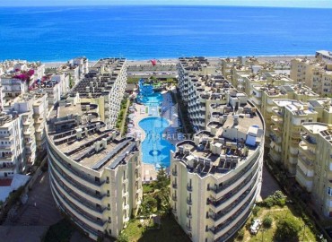 Стильная двухкомнатная квартира 50 м2, у самого моря, в комплексе с отельной инфраструктурой в Махмутларе, Аланья ID-13090 фото-13