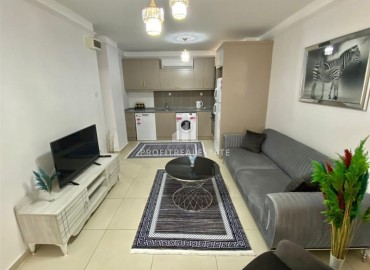 Stylish one-bedroom apartment 50 m2, near the sea, in a residence with hotel facilities in Mahmutlar, Alanya ID-13090 фото-2