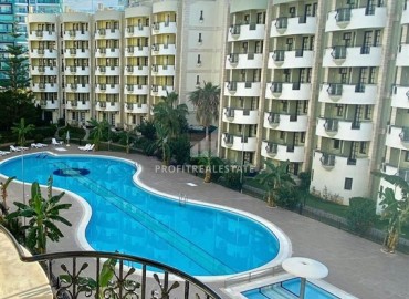 Стильная двухкомнатная квартира 50 м2, у самого моря, в комплексе с отельной инфраструктурой в Махмутларе, Аланья ID-13090 фото-11