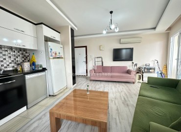 Просторная квартира с двумя спальнями, 115м² в 450м от моря в районном центре Эрдемли, Арпачбахшиш ID-13107 фото-5