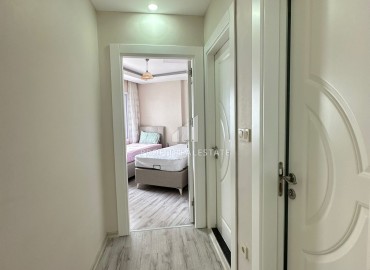 Просторная квартира с двумя спальнями, 115м² в 450м от моря в районном центре Эрдемли, Арпачбахшиш ID-13107 фото-10