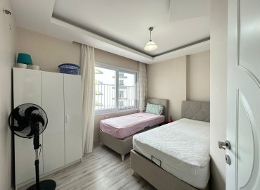 Просторная квартира с двумя спальнями, 115м² в 450м от моря в районном центре Эрдемли, Арпачбахшиш ID-13107 фото-12