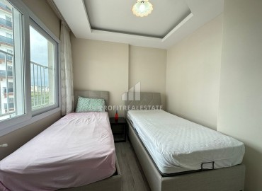 Просторная квартира с двумя спальнями, 115м² в 450м от моря в районном центре Эрдемли, Арпачбахшиш ID-13107 фото-14