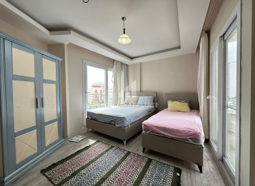 Просторная квартира с двумя спальнями, 115м² в 450м от моря в районном центре Эрдемли, Арпачбахшиш ID-13107 фото-16