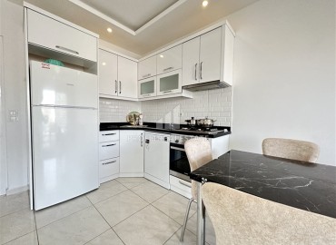 Меблированная двухкомнатная квартира, 60м², в Махмутларе, Алания, в резиденции с хорошей инфраструктурой ID-13108 фото-3