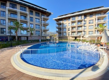 Bright two bedroom apartment in a new building, 82 m2, unfurnished, in a residence with facilities in Oba, Alanya ID-13117 фото-1