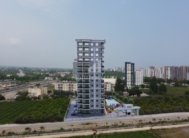 Инвестиционный проект премиум класса: квартиры 1+1, 2+1, 65-95м² в районе Мерсина - Арпачбахшиш. ID-13146 фото-9