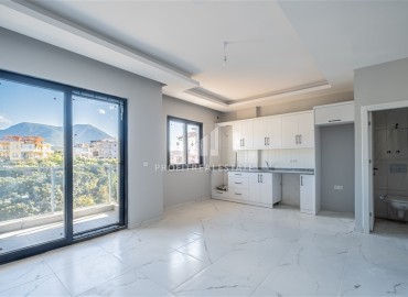 New duplex apartment 2 + 1 in the prestigious area of Oba, Alanya, 85 m2 ID-13164 фото-3