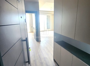 Стильная квартира с одной спальней, 71м², в новом комплексе в районе Томюк, Мерсин ID-13179 фото-3