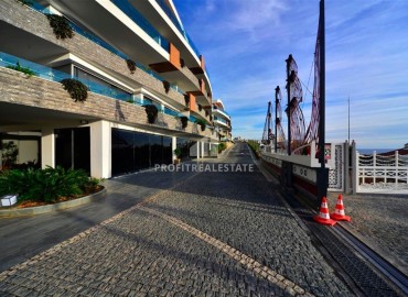 Фешенебельная двухкомнатная квартира 70м2, с панорамным видом на море, с инфраструктурой пятизвездочного отеля, в Конаклы, Алания ID-13197 фото-12