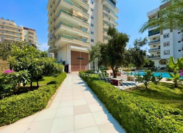 Ready to move in, one bedroom apartment, 75m², on the main street of Mahmutlar, 450m from the coast ID-13210 фото-2