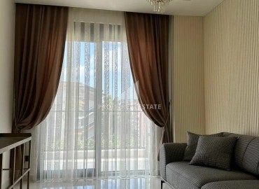 Apartment 1 + 1, 56m², in a new comfortable residence in the center of Alanya, 300m from the sea ID-13218 фото-2