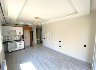 Новая трехкомнатная квартира, 90м², с чистовой отделкой в Мерсине, Тедже, в 600м от моря ID-13232 фото-4