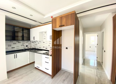 Новая трехкомнатная квартира, 90м², с чистовой отделкой в Мерсине, Тедже, в 600м от моря ID-13232 фото-7
