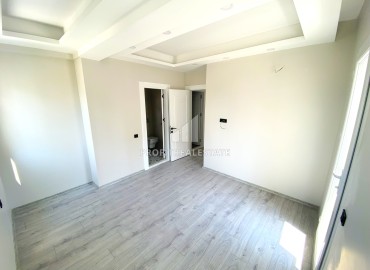 Новая трехкомнатная квартира, 90м², с чистовой отделкой в Мерсине, Тедже, в 600м от моря ID-13232 фото-15