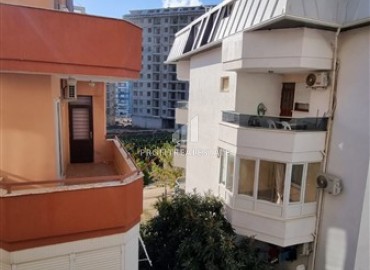 Недорогая двухкомнатная квартира 70 м2, без мебели, с кухонным гарнитуром и застекленным балконом, в Махмутларе, Аланья ID-13284 фото-16