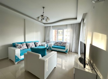 Элегантные меблированные двухкомнатные апартаменты 70 м2, в 200 метрах от моря, в Махмутларе, Аланья ID-13288 фото-2