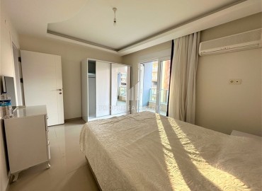 Элегантные меблированные двухкомнатные апартаменты 70 м2, в 200 метрах от моря, в Махмутларе, Аланья ID-13288 фото-7