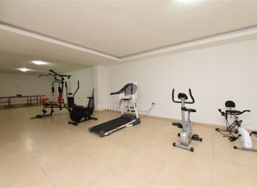 Элегантные меблированные двухкомнатные апартаменты 70 м2, в 200 метрах от моря, в Махмутларе, Аланья ID-13288 фото-14