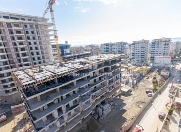 One-bedroom apartment, 55m², in a luxury residence under construction in Mahmutlar, Alanya ID-13315 фото-9