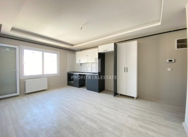 Апартаменты с двумя спальнями, 90м², в новом доме с парковкой в центре Мезитли, Мерсин ID-13327 фото-2