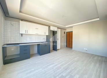 Апартаменты с двумя спальнями, 90м², в новом доме с парковкой в центре Мезитли, Мерсин ID-13327 фото-4