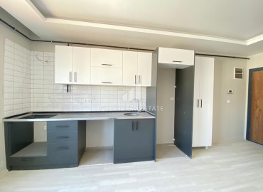 Апартаменты с двумя спальнями, 90м², в новом доме с парковкой в центре Мезитли, Мерсин ID-13327 фото-5