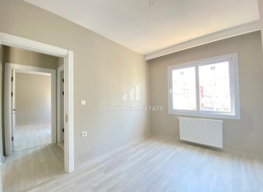 Апартаменты с двумя спальнями, 90м², в новом доме с парковкой в центре Мезитли, Мерсин ID-13327 фото-7