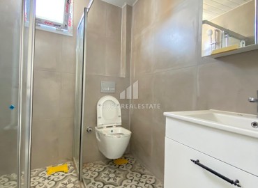 Two-bedroom apartment, 90m², in a new building with parking in the center of Mezitli, Mersin ID-13327 фото-12