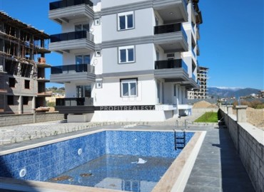 Новые двухкомнатные апартаменты в 600 метрах от моря, Газипаша, Аланья, 55 м2 ID-13330 фото-9