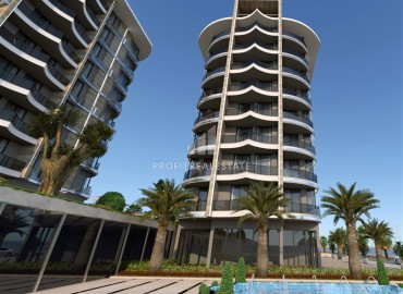 Двухкомнатная квартира 55 м2, в строящемся жилом комплексе класса люкс, в 100 метрах от моря, Тосмур, Аланья ID-13335 фото-7