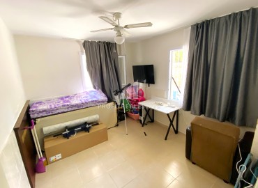 Меблированная квартира 2+1, 110м², в уютном комплексе с бассейном у моря в Тедже, Мерсин, по отличной цене ID-13374 фото-10