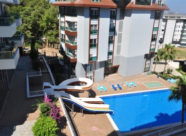 One-bedroom apartment with furniture and appliances, 450 meters from the sea, Kargicak, Alanya, 65 m2 ID-8904 фото-17