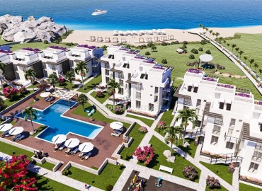 Квартиры 2+1 и 3+1 в резиденции собственным пляжем, на завершающем этапе строительства, Кючюкэренкёй, Северный Кипр, 115-142 м2 ID-13380 фото-1