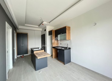Квартира с одной спальней, 50м², в газифицированном комплексе в районе Мезитли, Мерсин, микрорайон Куйулук ID-13385 фото-7