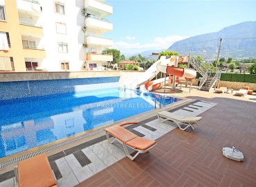 Furnished two-bedroom apartment, 125m², with mountain views in Mahmutlar, 400m from the sea ID-13410 фото-2