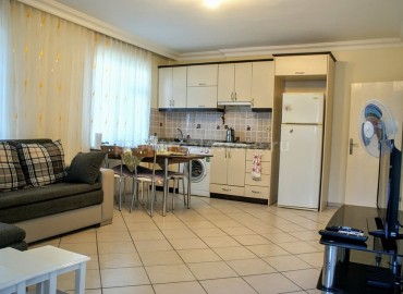 Квартира планировки 1+1 на центральной улице Махмутлар по очень низкой цене 30 000 евро 60 кв.м. ID-1034 фото-11
