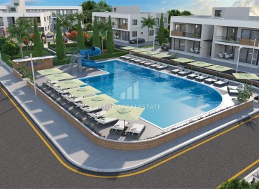 Инвестиционный проект с квартирами с личным выходом в сад, в 500 метрах от моря, Новый Босфор, Фамагуста, Северный Кипр 66-240 м2 ID-13428 фото-1
